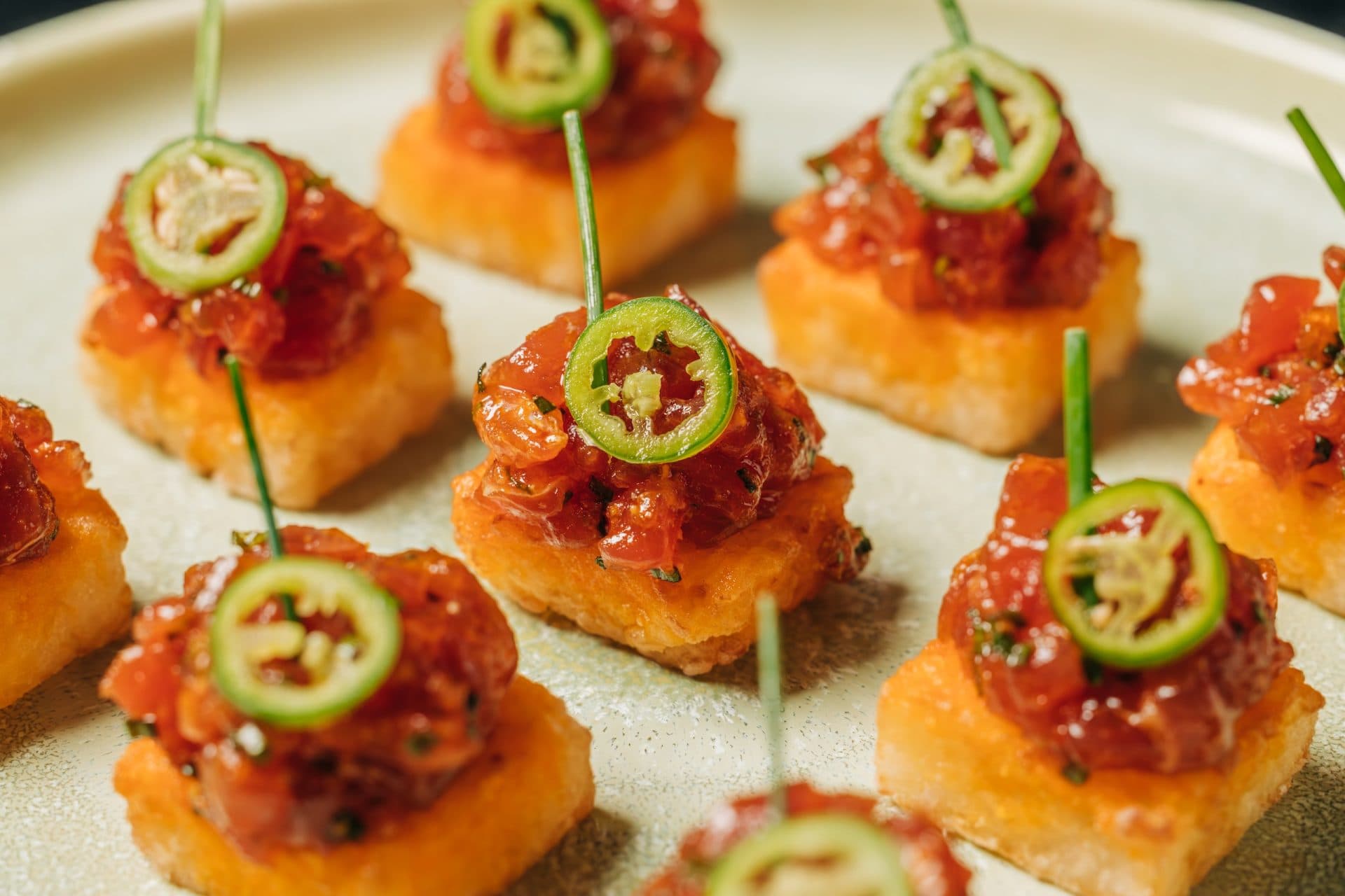 A tray of crispy rice topped with fresh tuna and a slice of jalapeno at the Meta Apex Center, a premier Las Vegas event venue